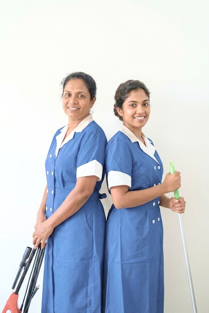 Sadlan Janitorial cleaning staff in uniform with professional cleaning equipment